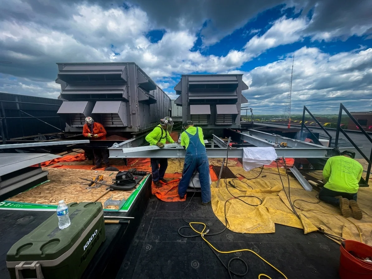 Rooftop installation crew, from the original SURE Mechanical website
