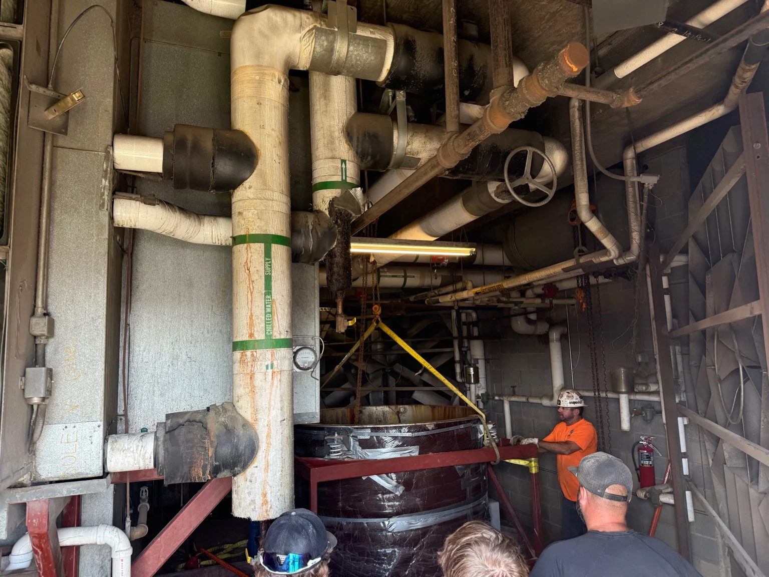SURE Mechanical crew working at the UC MAB project.